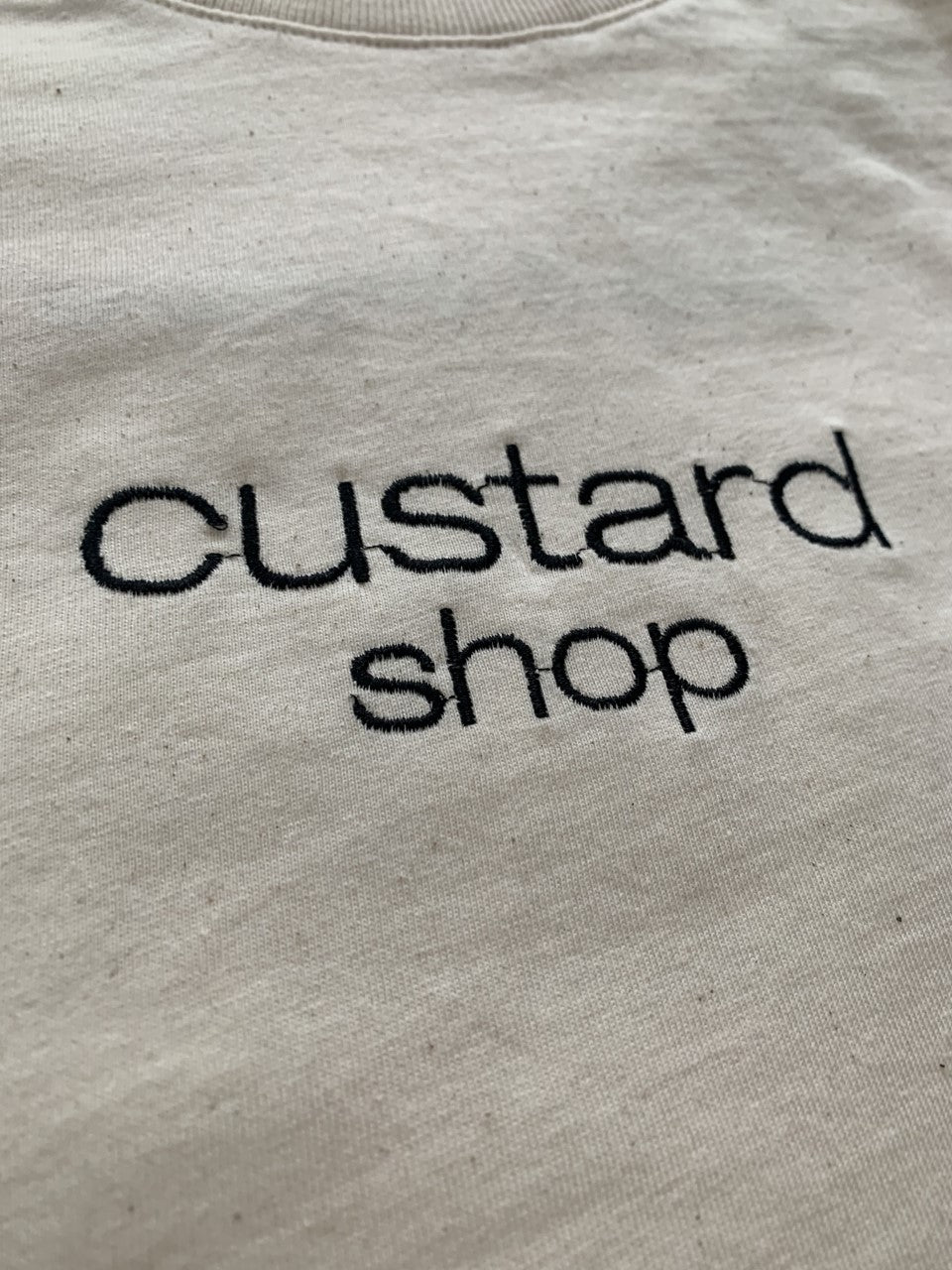 Custard Shop Official Embroidered Chest Logo | Beige Custard Shop Official